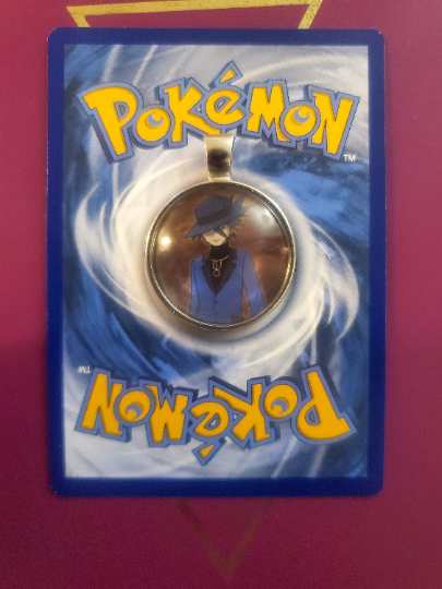 Trainer Riley Pendant or Keychain - 25mm Round Video Game Jewelry Accessory