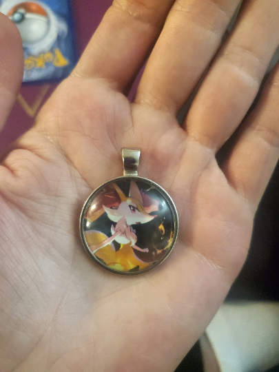 Braxien Pendant or Keychain - 25mm Round Video Game Jewelry Accessory